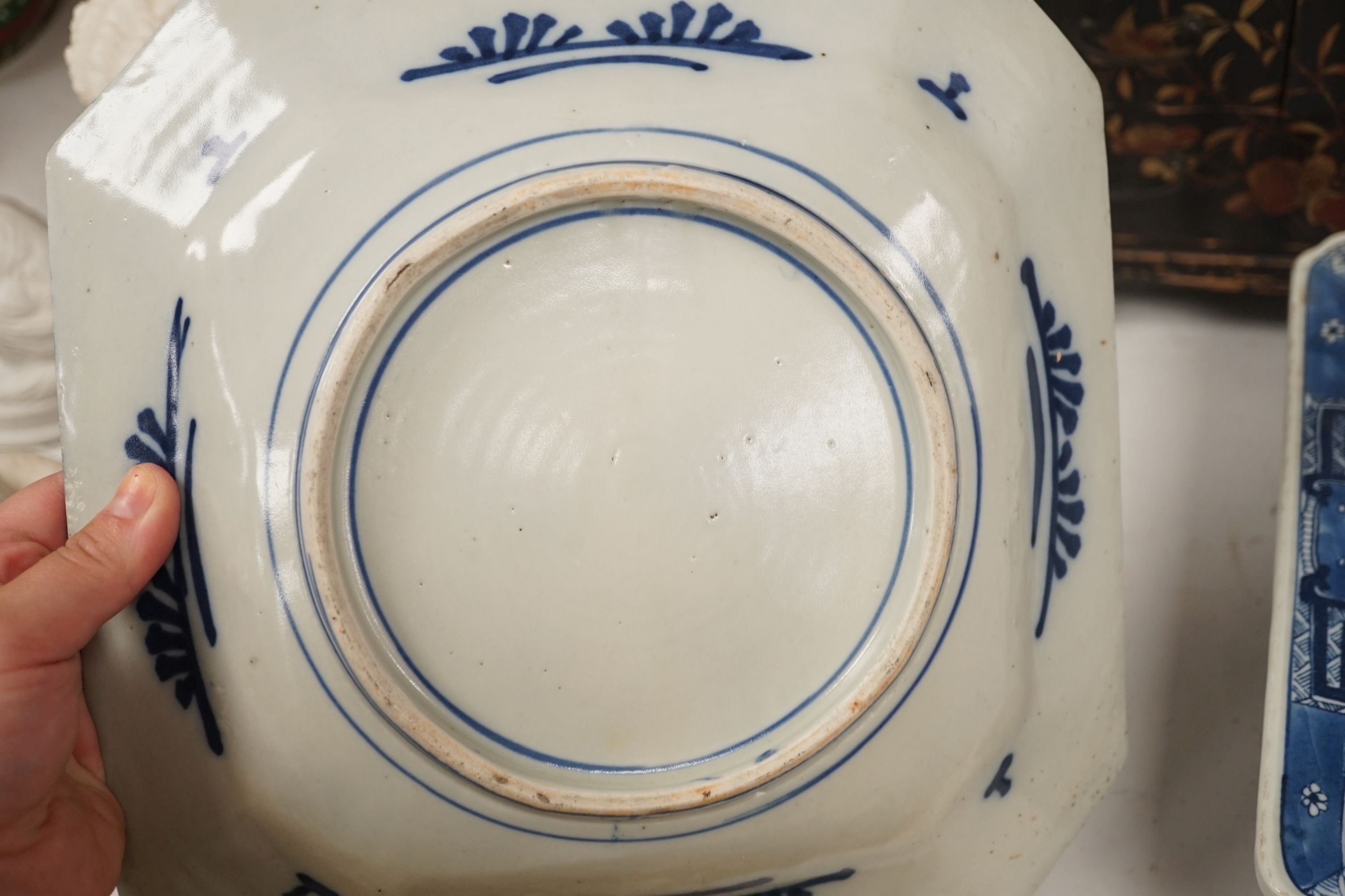 A rectangular Chinese dish, a square blue and white dish and a Japanese lacquer cabinet, rectangular dish 40 cms wide x 28 cms deep.